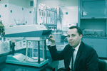 Man working in laboratory, Carling Brewery