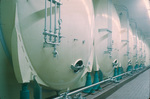 Room full of large tanks, Carling Brewery