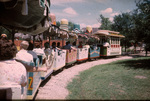 Passengers riding Ferrocarril Fiesta train at Six Flags Over Texas, April 1965