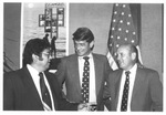 Three men, possibly Professional Air Traffic Controllers Organization (P. A. T. C. O.) officials