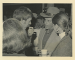 Joe Dulle talking to a Man with a Cowboy Hat