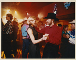 Chuck Norris dancing with Sheree Wilson