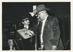 Luke Short III presenting a Certificate
