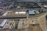 Aerial photograph of a large building and amusement park