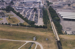 Aerial photograph of a parking lot and railroad
