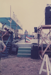 Man Holding a Flag on Stage