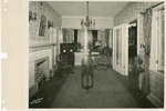 Living room scene in Lighting Fixture Display Bungalow, in office of Texas Power & Light Company at Waco