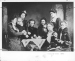 Arlington, Texas women posed at tea table