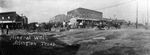 Arlington, Texas' Mineral Well surrounded by four of the town's doctors and the first cars in town