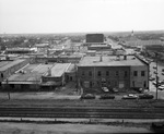 Arlington, Texas streets and parking lots with railroad tracks in the foreground