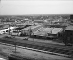 Arlington, Texas streets and parking lots with railroad tracks in the foreground