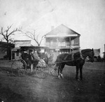 B. W. Collins family in front of the Pacific Hotel, Arlington, Texas