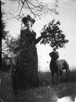 Mary G. Johnston posing with dog