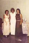 A photograph of three unidentified group of African American women