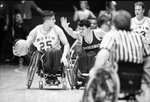 University of Texas at Arlington (U. T. A.) Movin' Mavs wheelchair basketball game during Final Four play, 03/09/1994