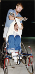 Jim Hayes and others in racing chairs on an athletic track