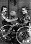 Jim Hayes with player #20, University of Texas at Arlington (U. T. A.) wheelchair basketball