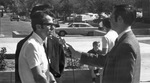 Fraternity student with reporters during Rebel theme controversy, University of Texas at Arlington (U.T.A.)