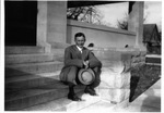 Count Brooke Capps, on the porch at 1120 Penn Street, Fort Worth, Texas