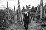 U.S. soldiers with Viet Cong suspects in the Vietnam War