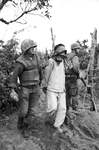 U.S. soldiers with Viet Cong suspects in the Vietnam War
