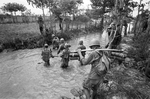 U.S. soldiers crossing canal in the Vietnam War