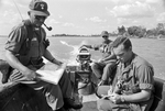 Bob Schieffer interviewing Gill Young and Ron Cornett on patrol in Mekong River by Bob Schieffer