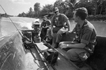 Bob Schieffer interviewing Gill Young and Ron Cornett on patrol in Mekong River