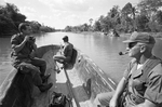 Bob Schieffer interviewing Lee Sams on patrol in Mekong River