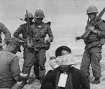 Unidentified soldiers and prisoners by Bob Schieffer