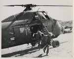 Photo of a helicopter with soldiers