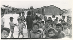 Photo of children with Eddie Adams