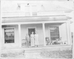 Jessie Myers standing on porch of her aunt in Russellville, Arkansas