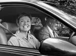 Ryan and Susan Amacher in new Buick from Arlington General Motors plant by Jeffery Washington