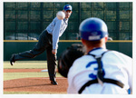 President Spaniolo throwing first pitch at Clay Gould Ballpark