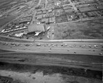 Interstate 35E north of downtown Dallas. The Cabana Motor Hotel is in the middle of the photograph by Squire Haskins Photography Inc.