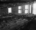 Empty banquet hall. Tables are set and taper candles are lit at the tables by Squire Haskins Photography Inc.