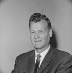 Photograph of a man in a business suit by Squire Haskins Photography Inc.