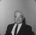 Photograph of a man in a business suit by Squire Haskins Photography Inc.