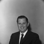 Photograph of a man in a business suit by Squire Haskins Photography Inc.