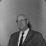 Photograph of a man in a business suit by Squire Haskins Photography Inc.