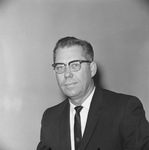 Photograph of a man in a business suit by Squire Haskins Photography Inc.