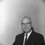 Photograph of a man in a business suit by Squire Haskins Photography Inc.