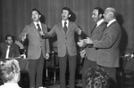 Men's quartet performing at a function by Squire Haskins Photography Inc.