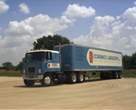 Color photograph of an Economics Laboratory semi-trailer by Squire Haskins Photography Inc.