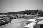 Massey Ferguson warehouse American-made automobiles parked around it by Squire Haskins Photography Inc.