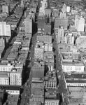 Aerial view of a parade, downtown Dallas, Texas by Squire Haskins Photography Inc.