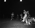 Football game, nighttime by Squire Haskins Photography Inc.