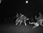 Football game, nighttime by Squire Haskins Photography Inc.