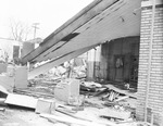 Gas station, possibly hit and damaged by a vehicle by Squire Haskins Photography Inc.